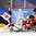GANGNEUNG, SOUTH KOREA - FEBRUARY 12: Switzerland's Isabel Waidacher #24 and Nicole Gass #8 battle for a loose puck with Japan's Chiho Osawa #12 and Shoko Ono #27 in front of Nana Fujimoto #1 during preliminary round action at the PyeongChang 2018 Olympic Winter Games. (Photo by Matt Zambonin/HHOF-IIHF Images)

